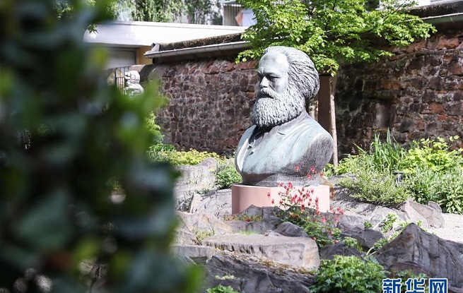 王滬寧出席紀(jì)念馬克思誕辰200周年理論研討會并講話