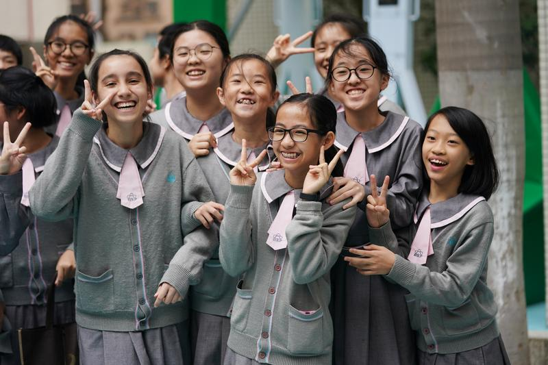 2019年12月19日，習(xí)近平總書記視察澳門濠江中學(xué)附屬英才學(xué)校。圖為當(dāng)日拍攝的濠江中學(xué)附屬英才學(xué)校學(xué)生。 新華社記者 王申/攝